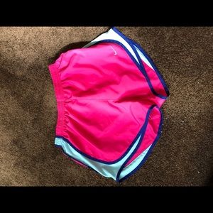 Pink Nike running shorts